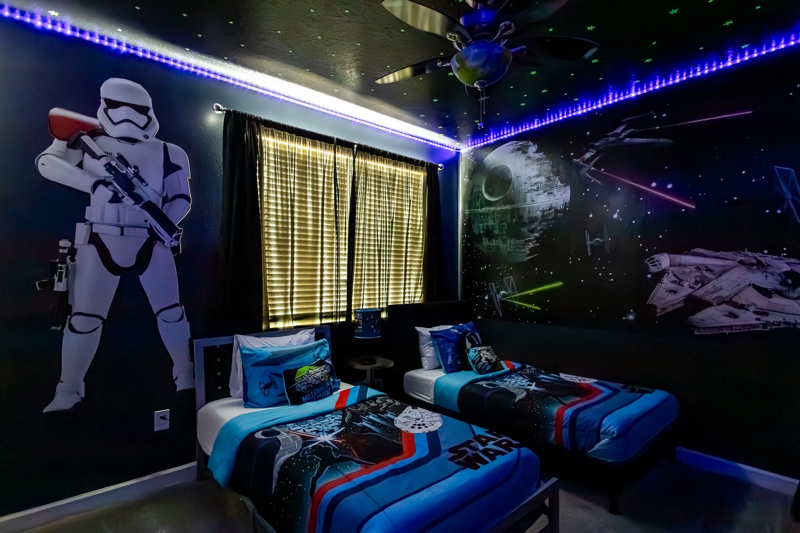 Feel the force in this 2nd-floor bedroom, offering two twin beds & a smart TV