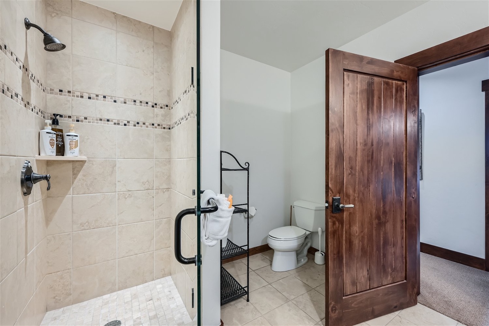 Enjoy an oversized vanity & shower in the final full bath