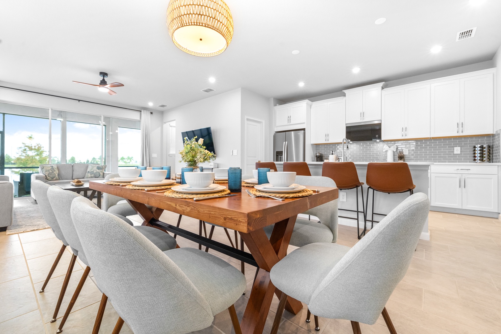 Gather for meals together at the elegant dining table, seating 8