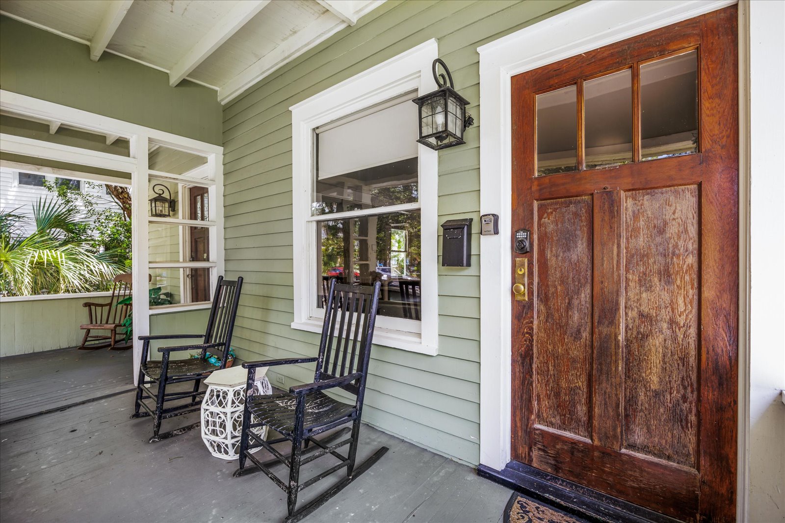 Take in the fresh air on this ground-level condo’s front porch