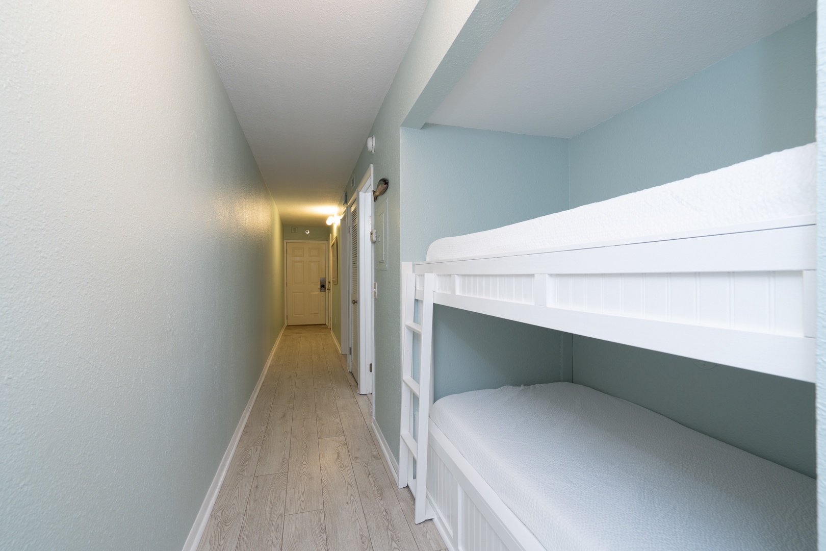 The cozy twin bunks in the alcove are ideal for an afternoon snooze