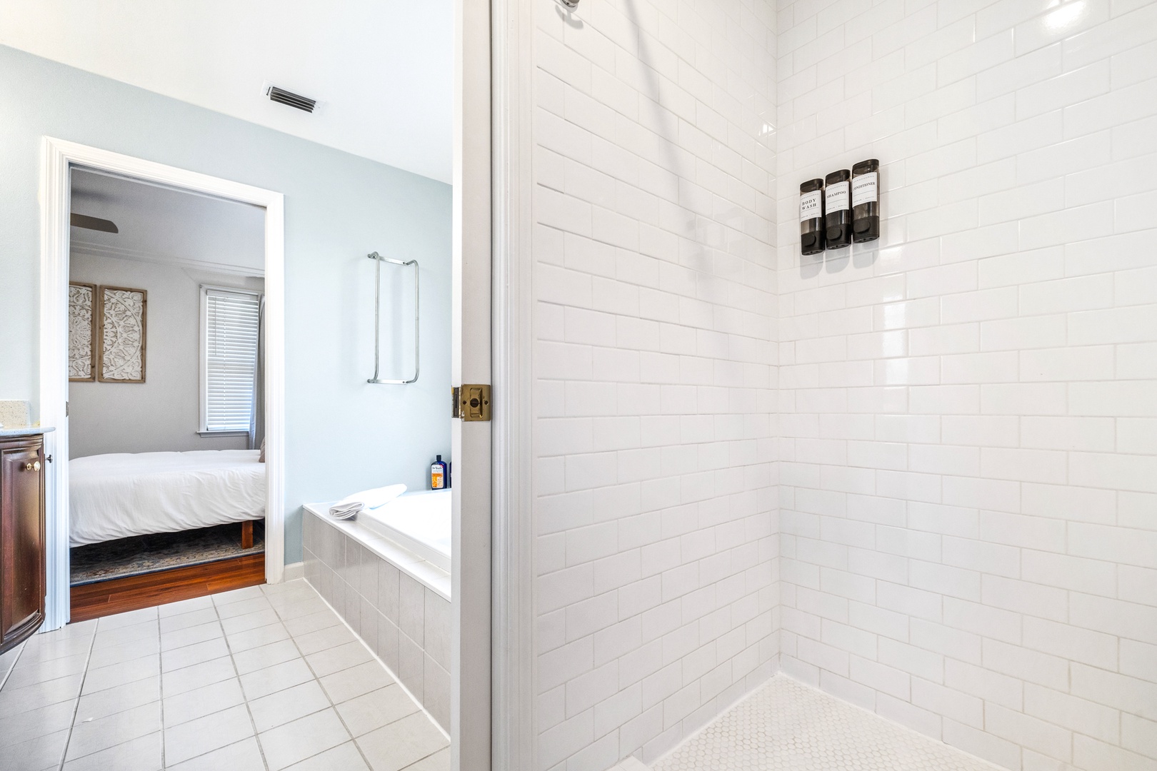 Ensuite bathroom with separate shower and tub