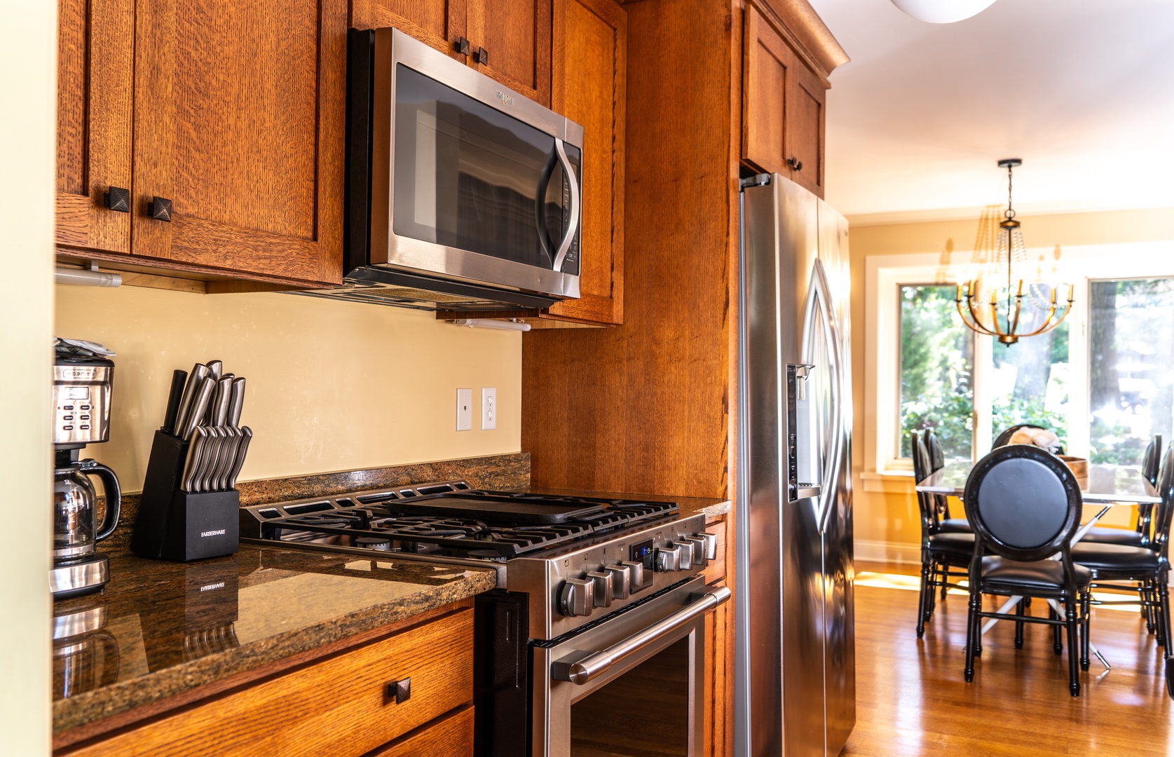 The fully equipped kitchen offers ample space & all the comforts of home