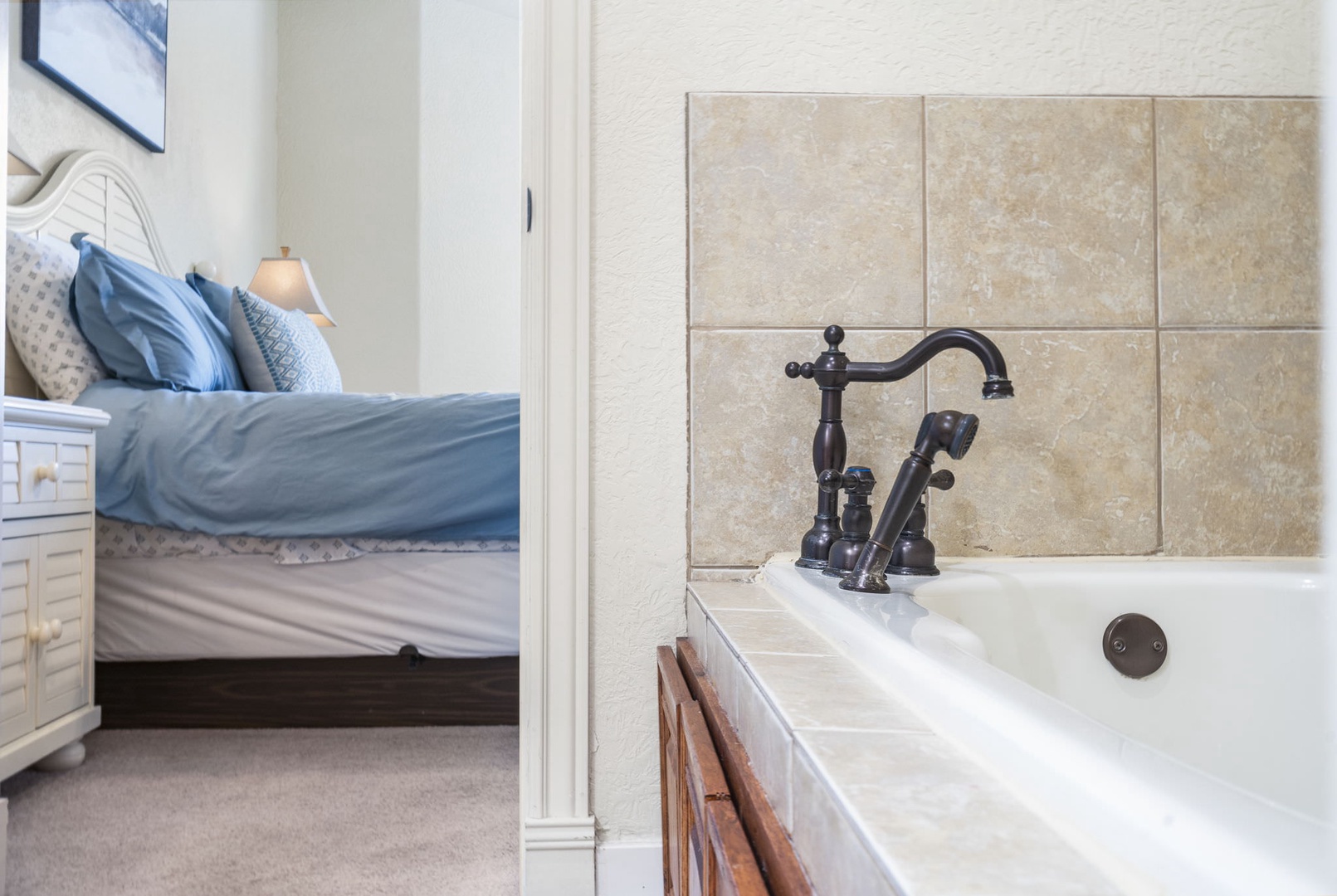The spacious king en suite offers dual vanities & separate shower/soaking tub