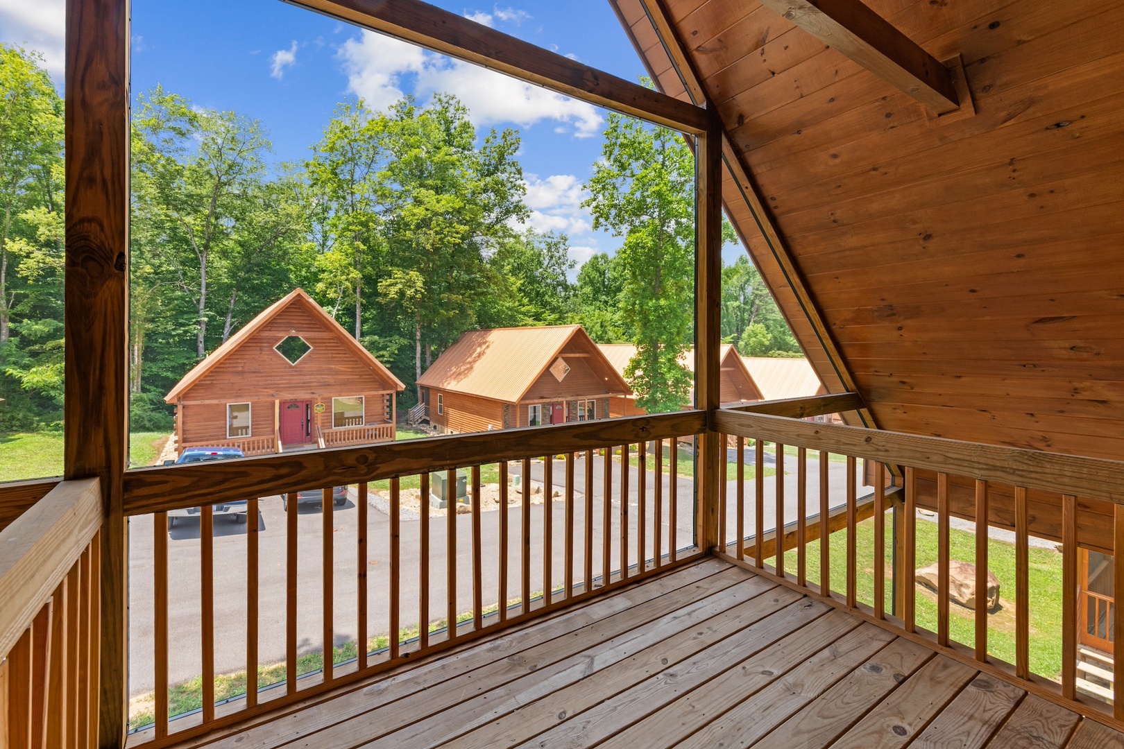 Step out onto the upper-level deck & take in the serene view!