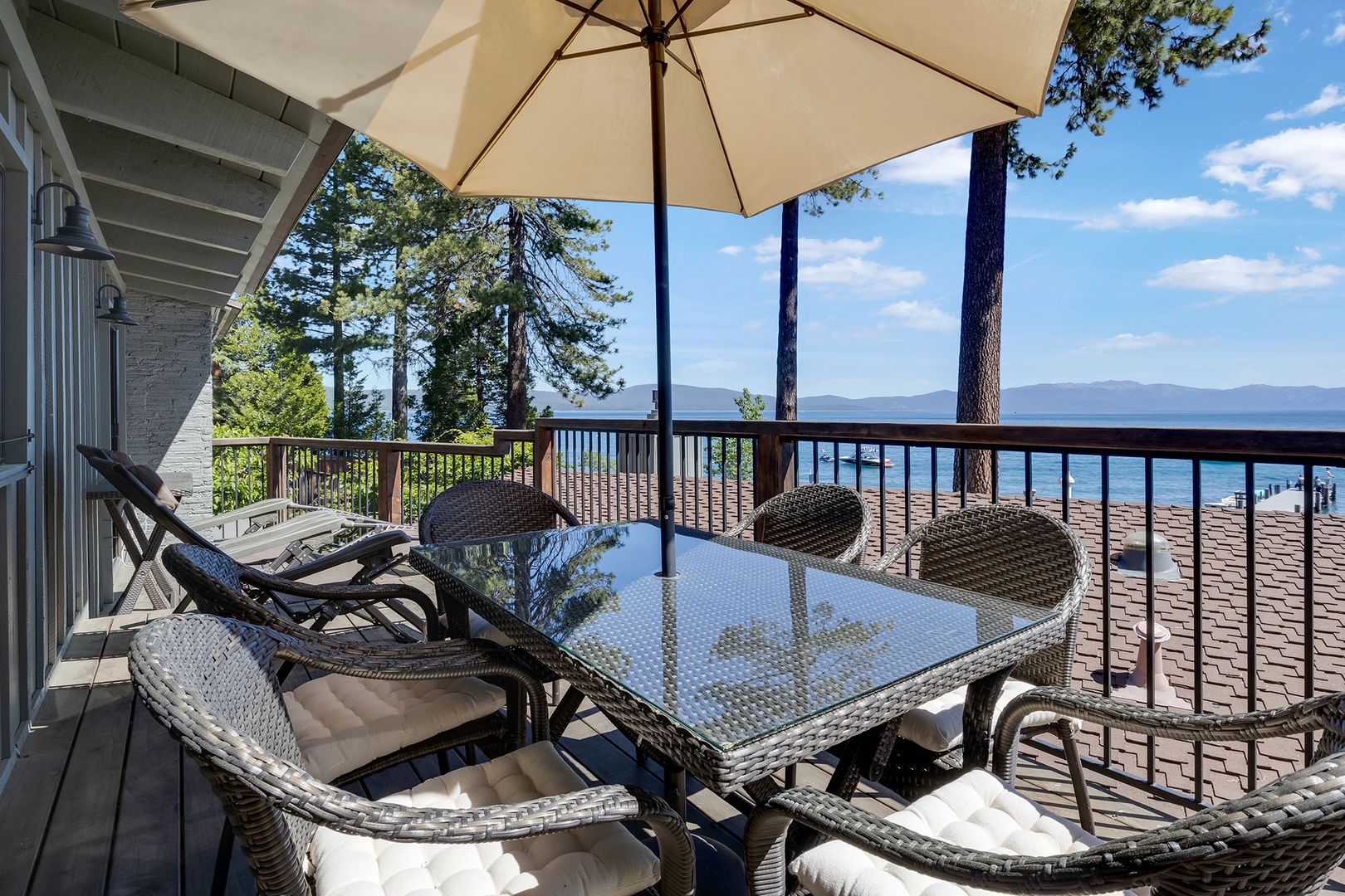 Lounge chairs and outdoor dining in the balcony