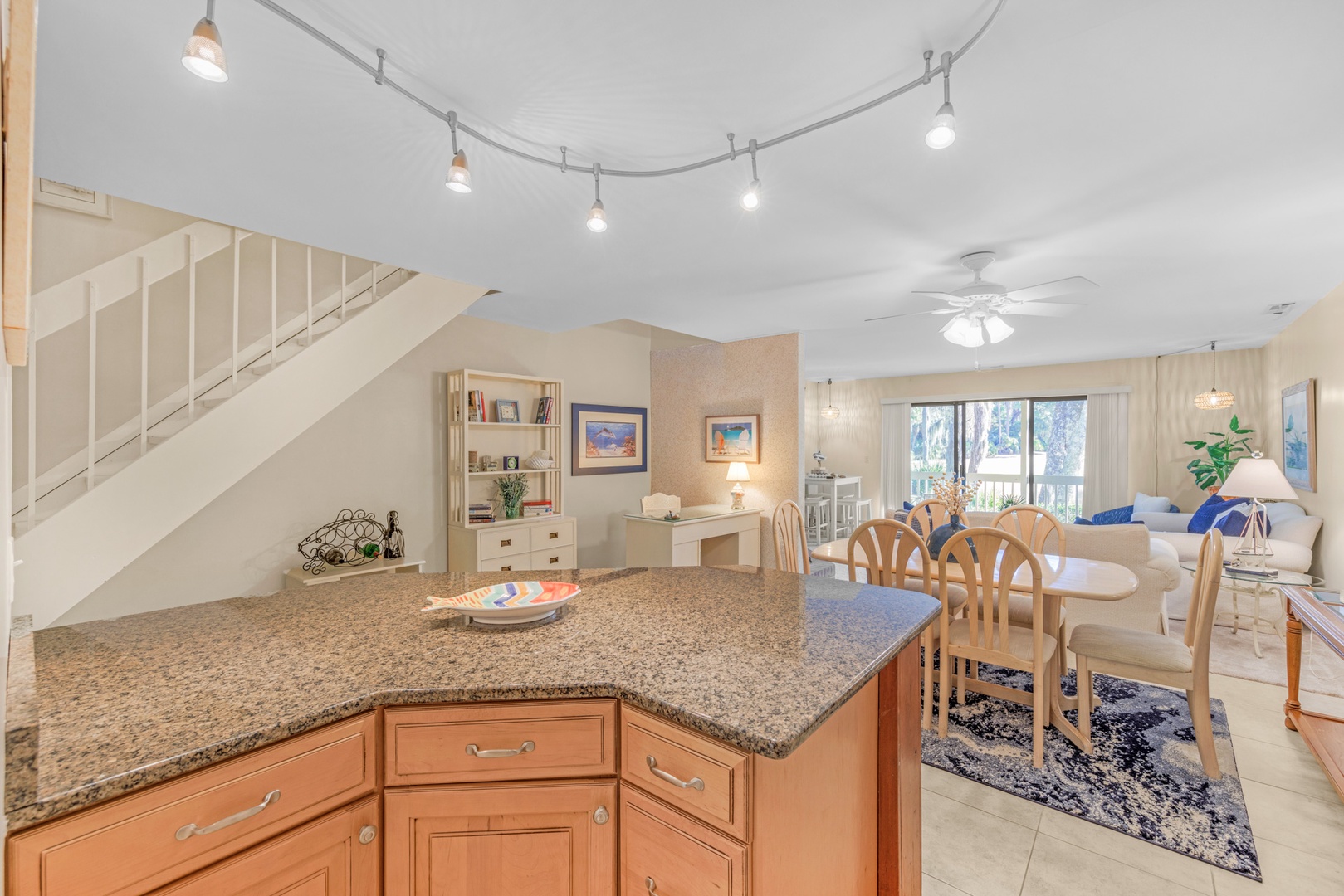 This quaint kitchen offers ample storage space & all the comforts of home