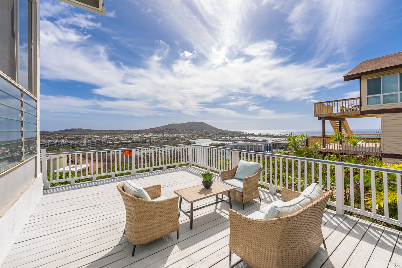 Large lanai with outdoor seating and spectacular views