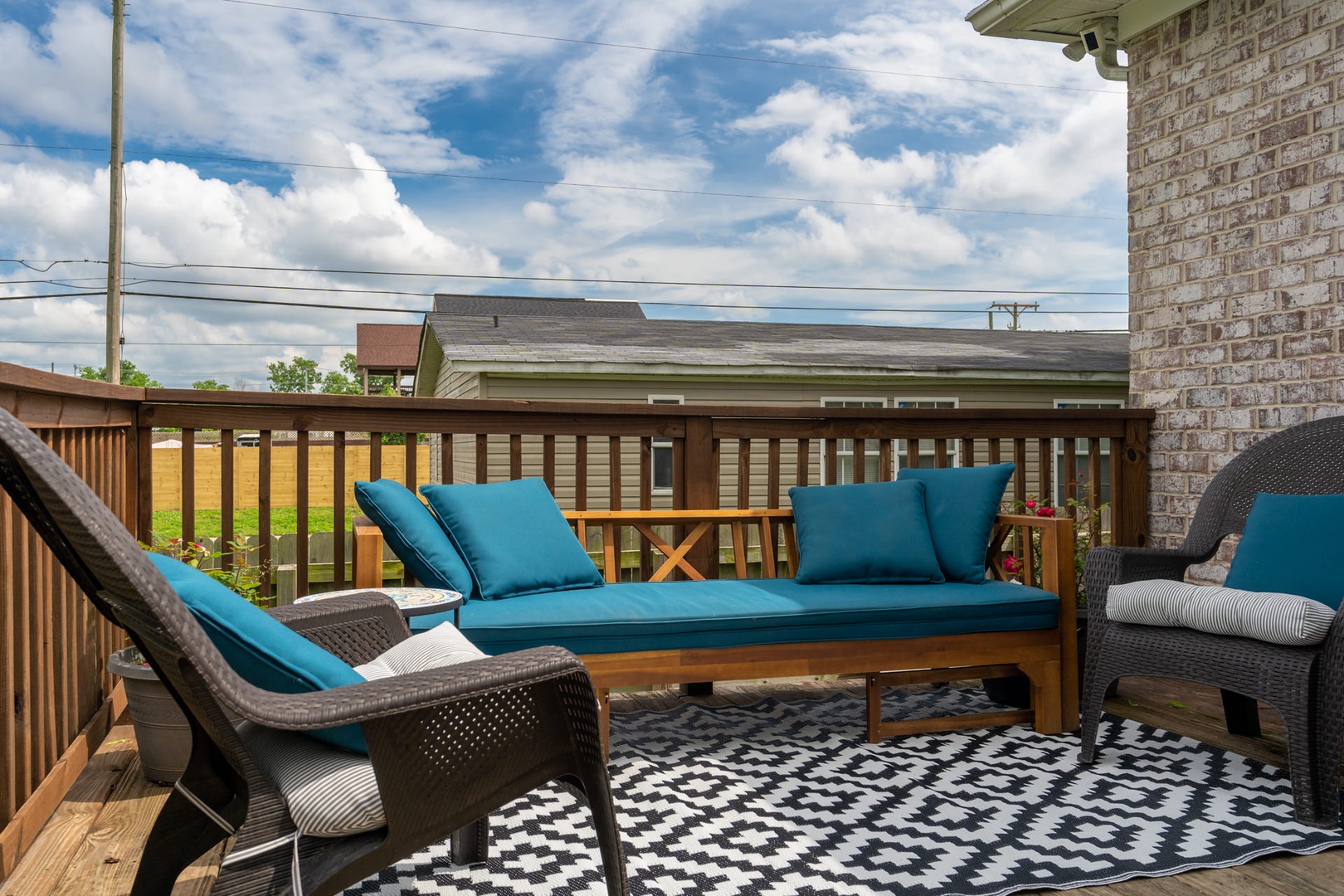 Patio with outdoor seating and gas BBQ grill