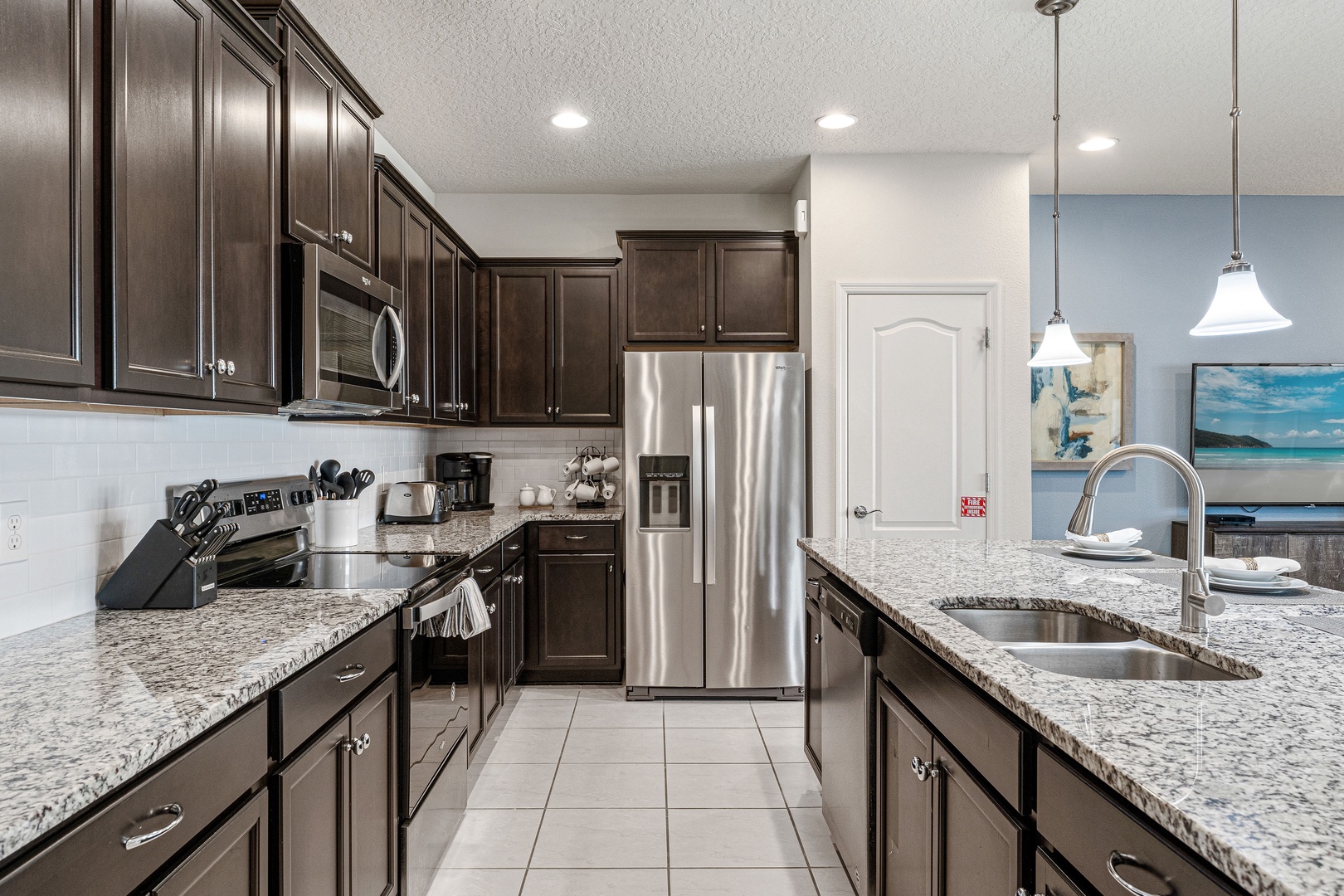 The updated kitchen offers loads of space & all the comforts of home