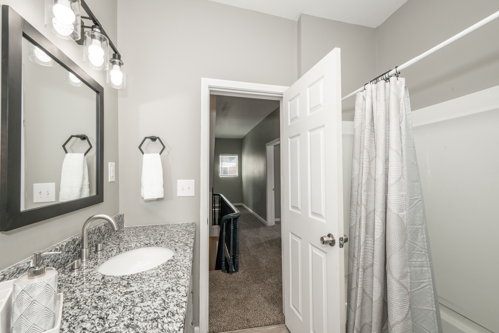 The 2nd floor full bath offers a spacious single vanity & shower/tub combo
