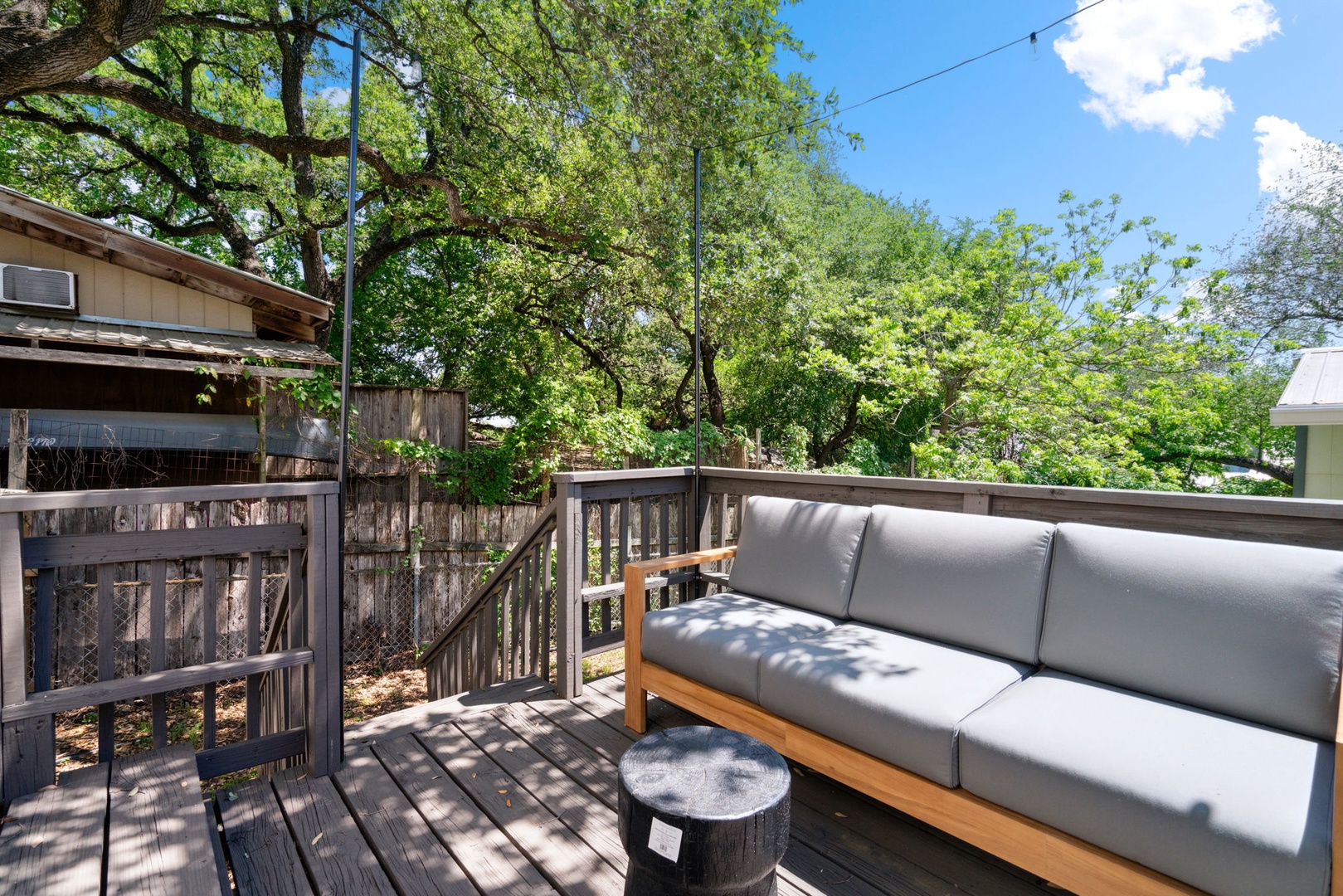 Kick back & relax in the sunshine on the cozy back deck!
