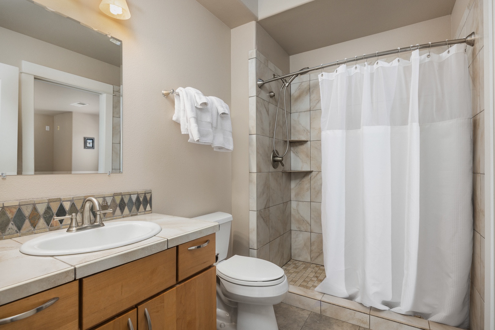 Shared bathroom with stand-up shower