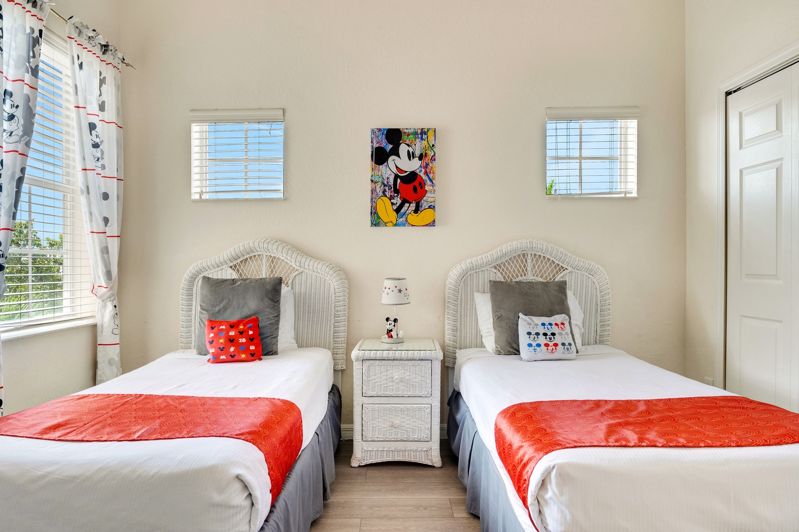 A pair of cozy twin beds & TV await in the final bedroom retreat