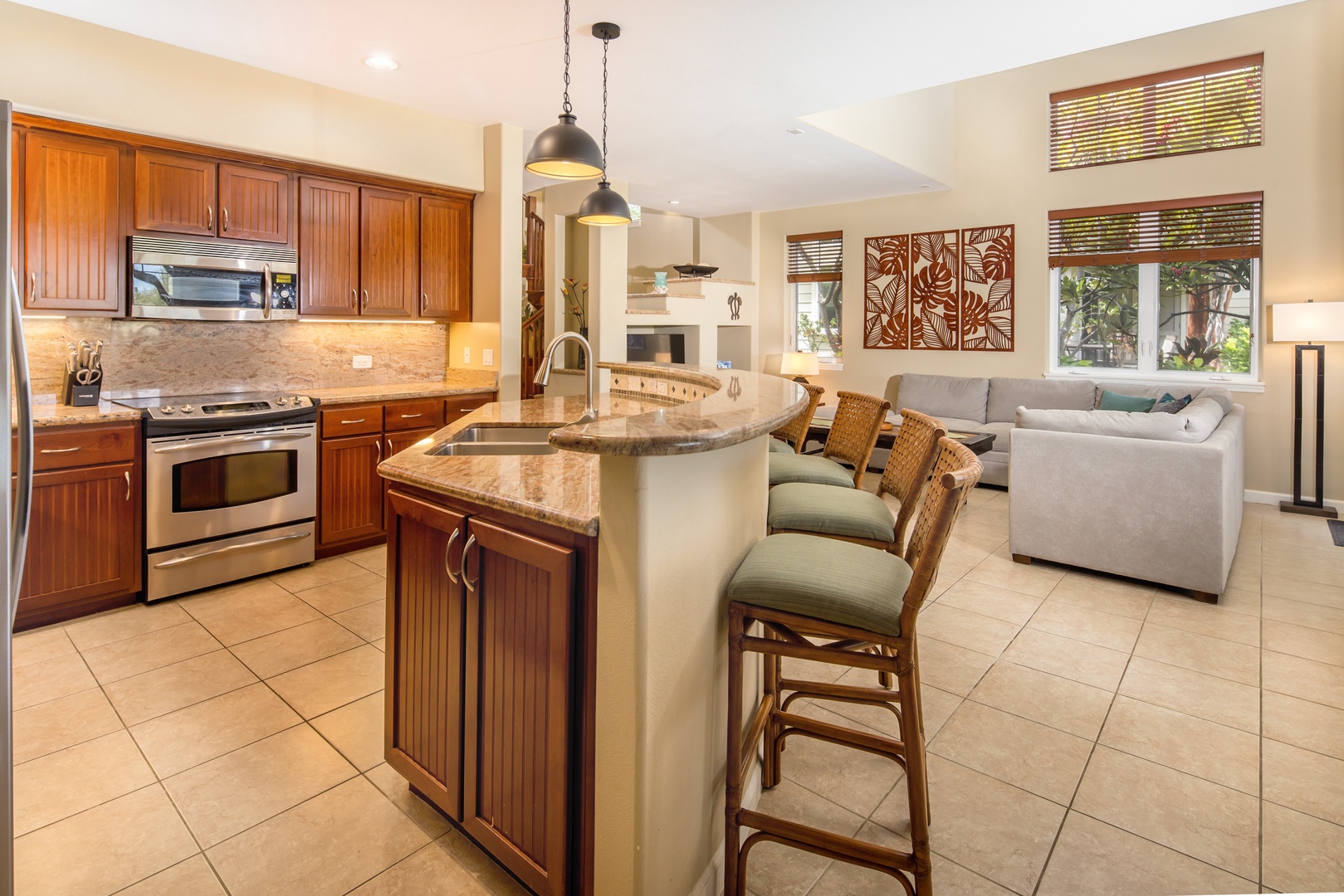 Well-appointed kitchen with all the essentials and counter seating