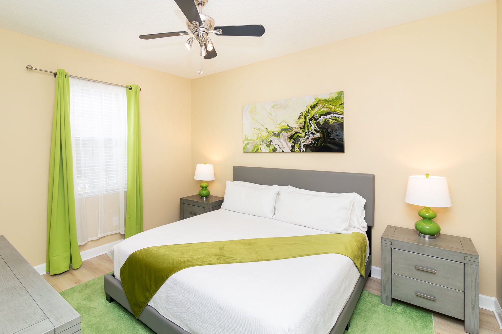 This colorful main-floor king suite boasts a smart TV and Jack & Jill ensuite