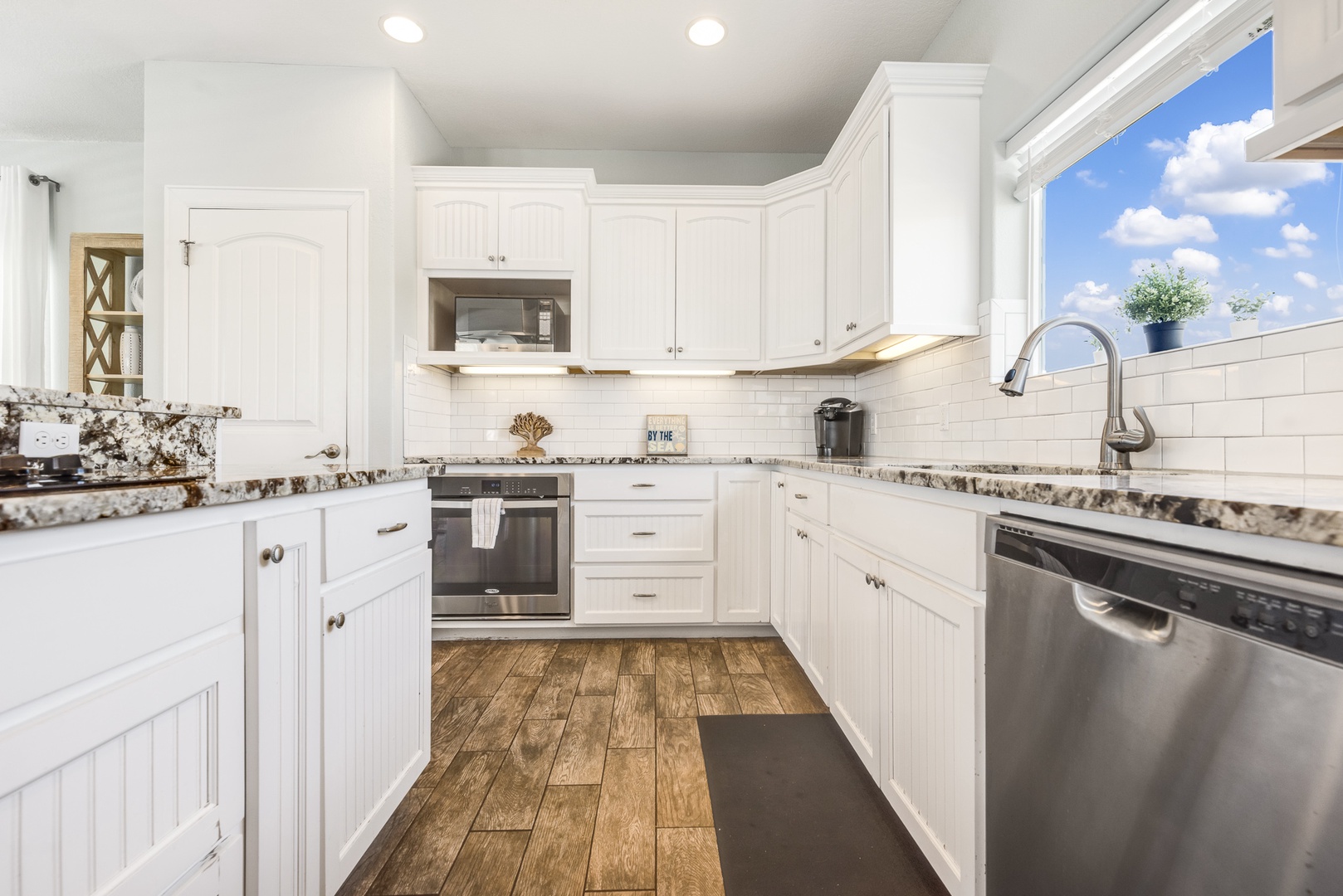 The breezy 3rd Floor Kitchen offers fantastic amenities and tons of counter space & storage
