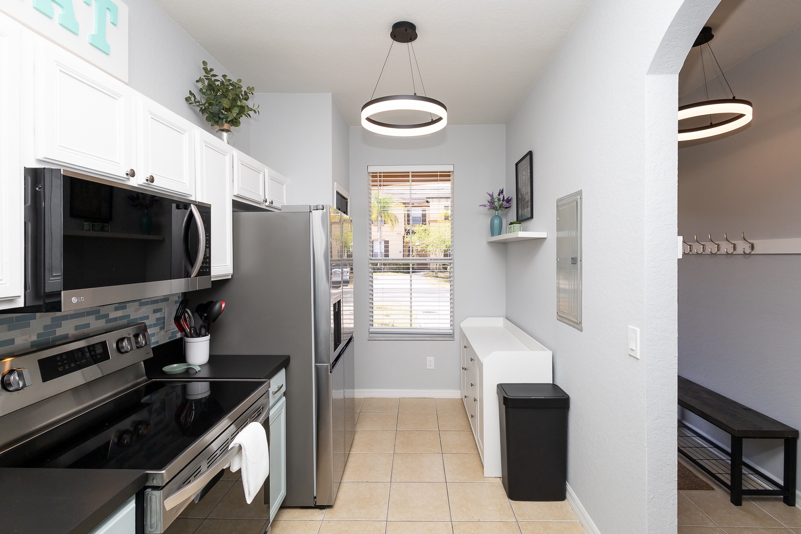 The open, airy kitchen offers ample space & all the comforts of home