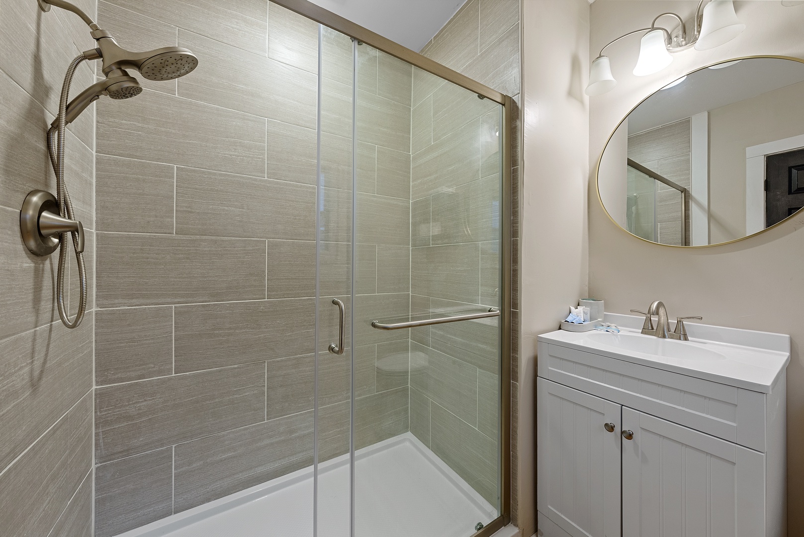 A single vanity & glass shower await in the 2nd-floor full bathroom