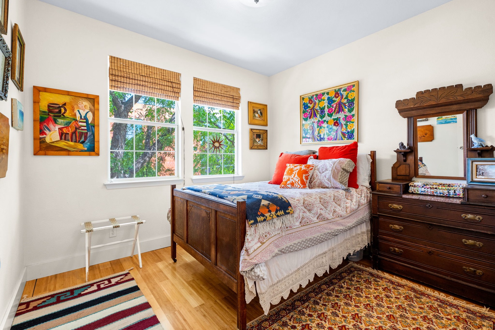 The 2nd floor secondary queen bedroom is the perfect boho retreat
