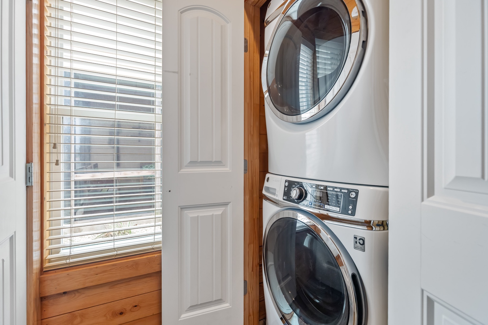 Stacked washer and dryer for guest use