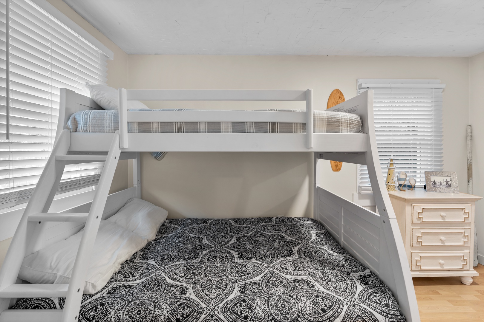 A twin-over-full bunkbed awaits in the second serene bedroom
