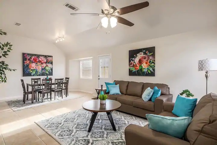 Enjoy the breezy, open layout of the living, dining, & kitchen areas