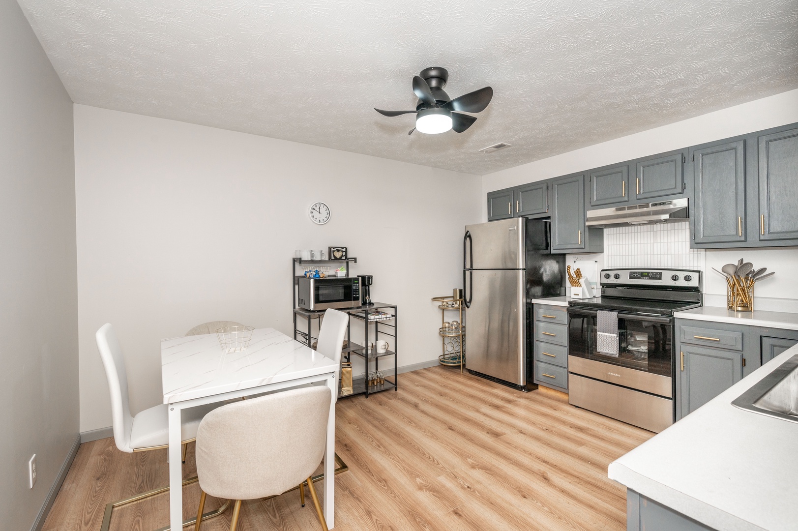 Apartment 1’s elegant kitchen offers ample space & all the comforts of home