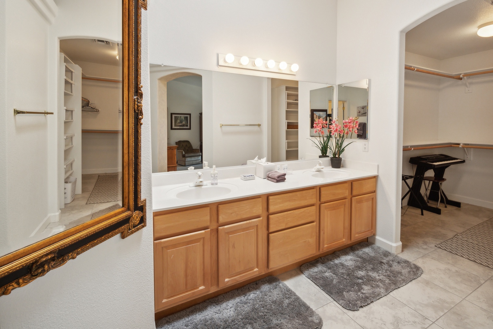 A double vanity & shower await in this luxe ensuite