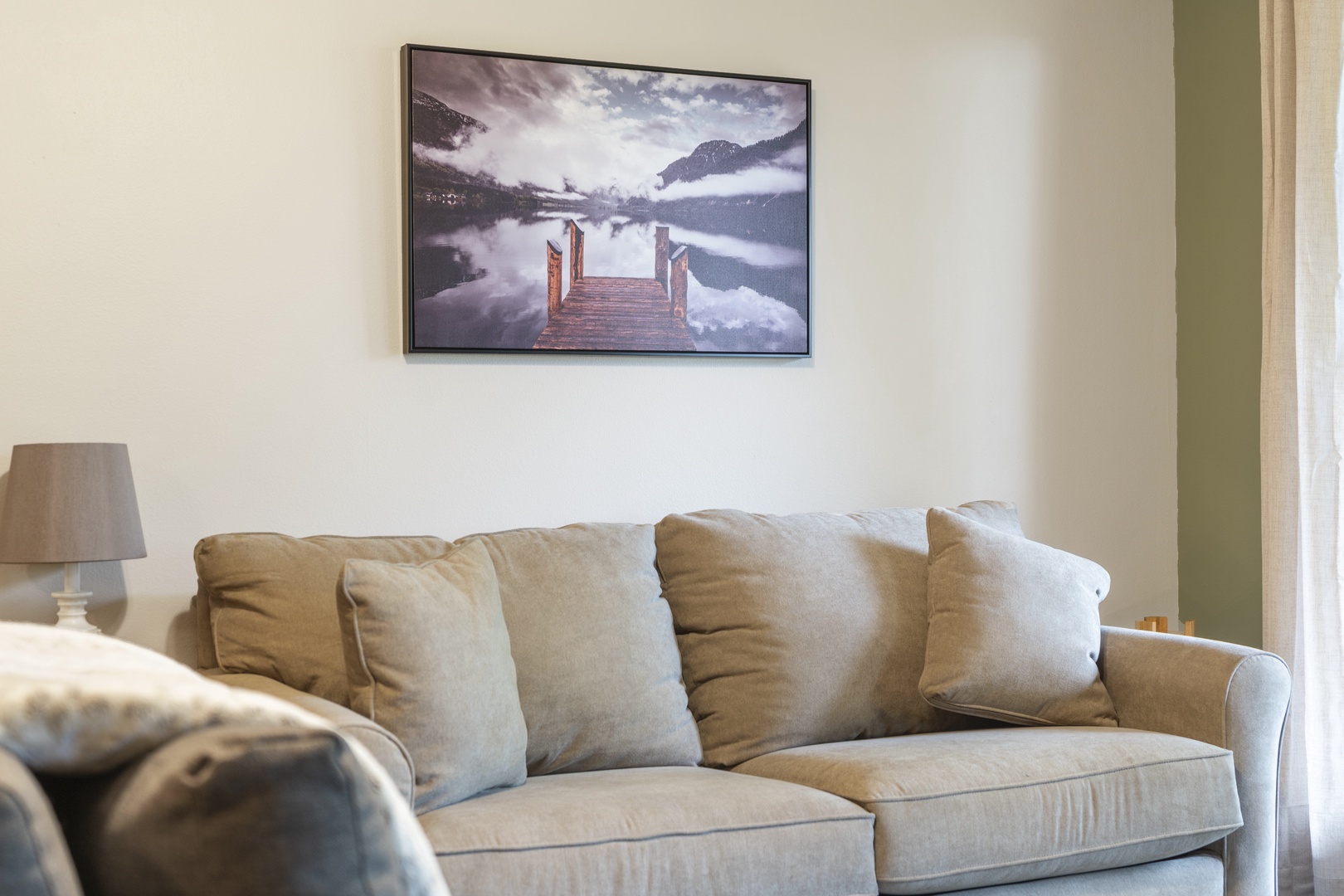 Cozy living area with ceiling fan, cable TV & deck access