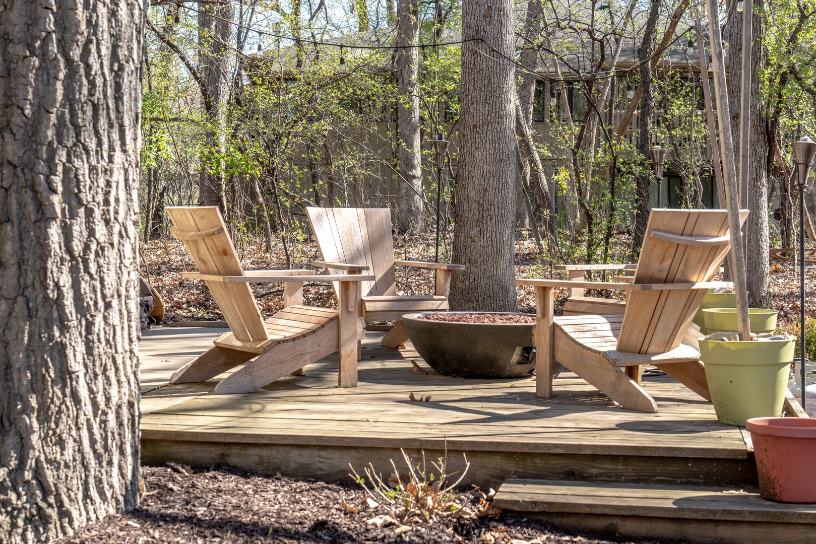 Lounge the day away around the firepit & make memories under the trees