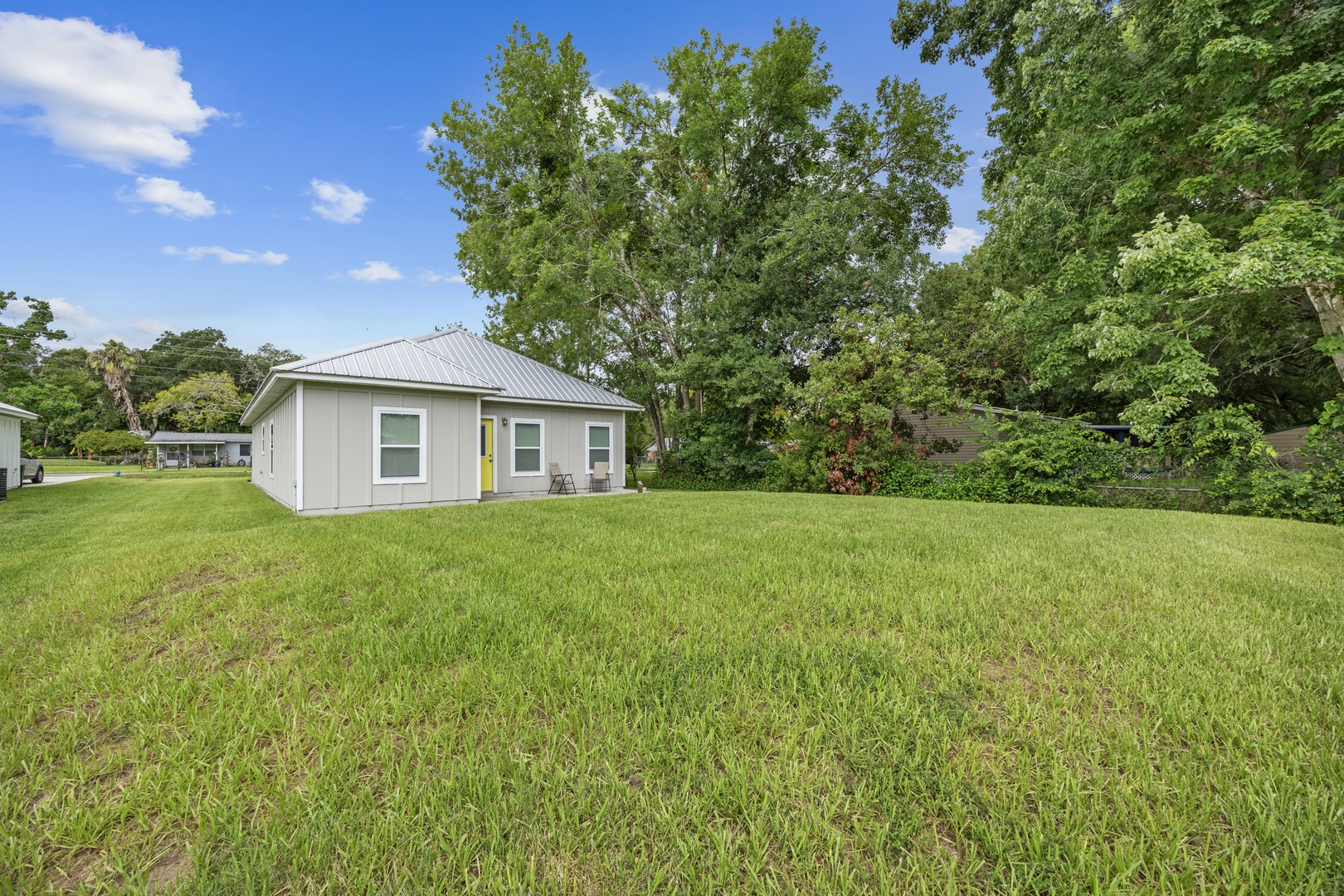 The large back yard offers ample space for relaxation & play