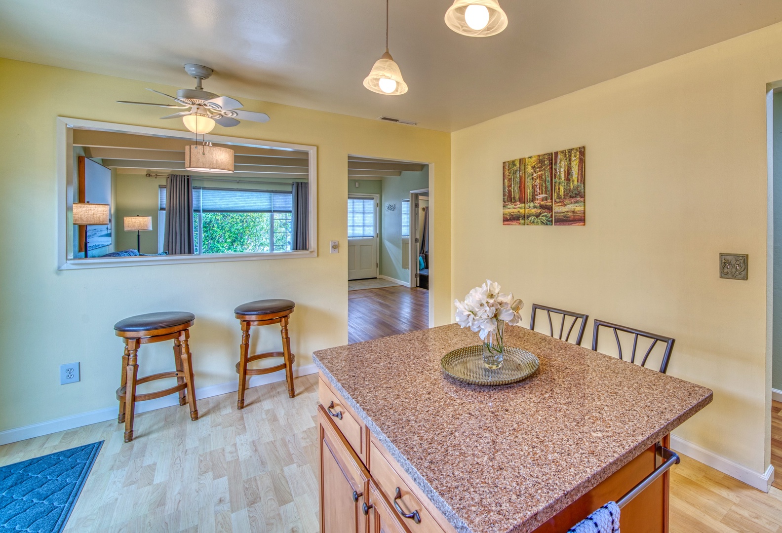 The open, airy kitchen offers ample space & all the comforts of home