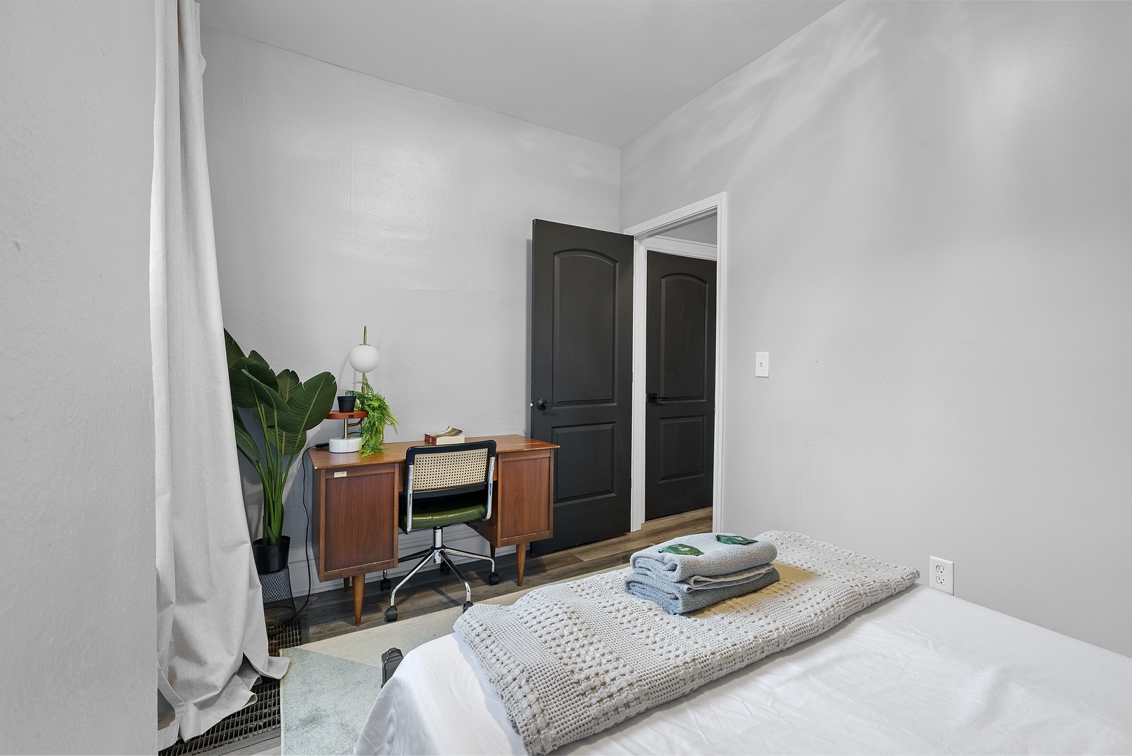 Recharge or catch up on emails in Apartment 1164’s second stylish king bedroom