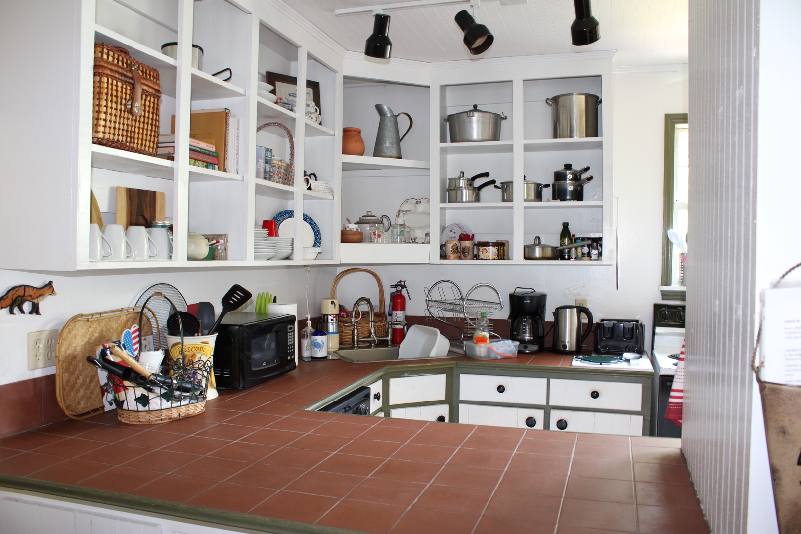 The kitchen offers lots of counter space & is well-equipped for your visit