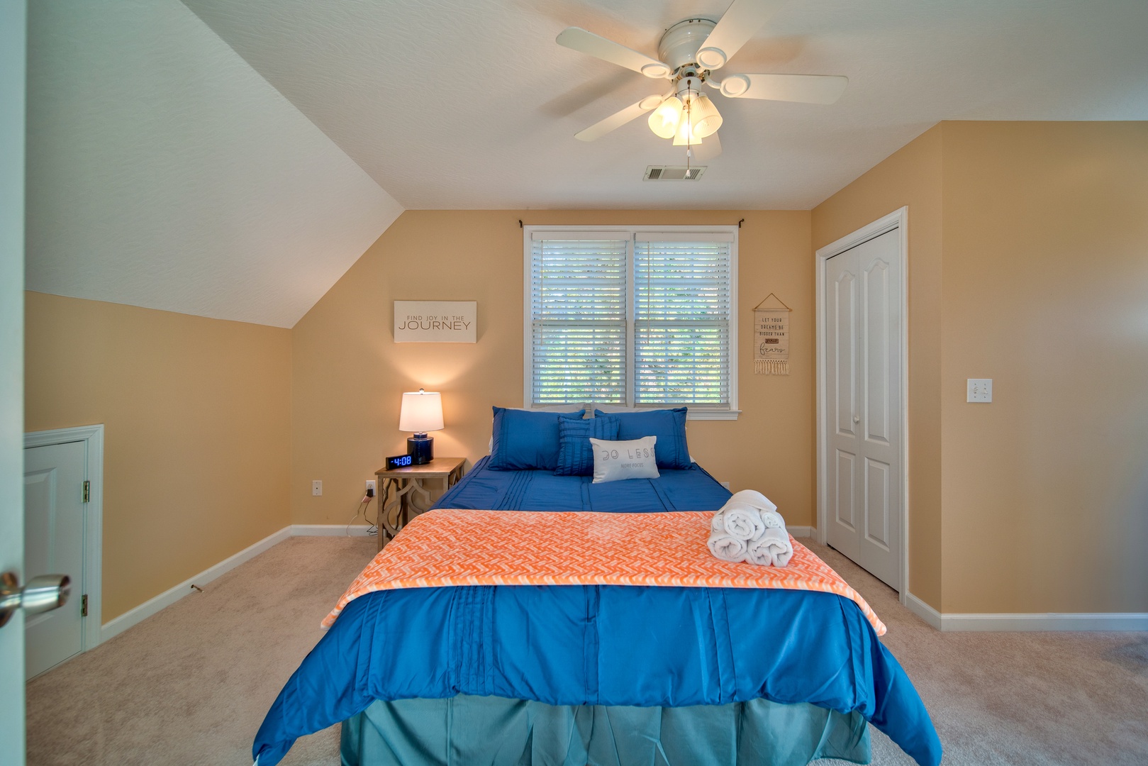 The second of two 2nd floor bedrooms, offering a comfortable queen bed