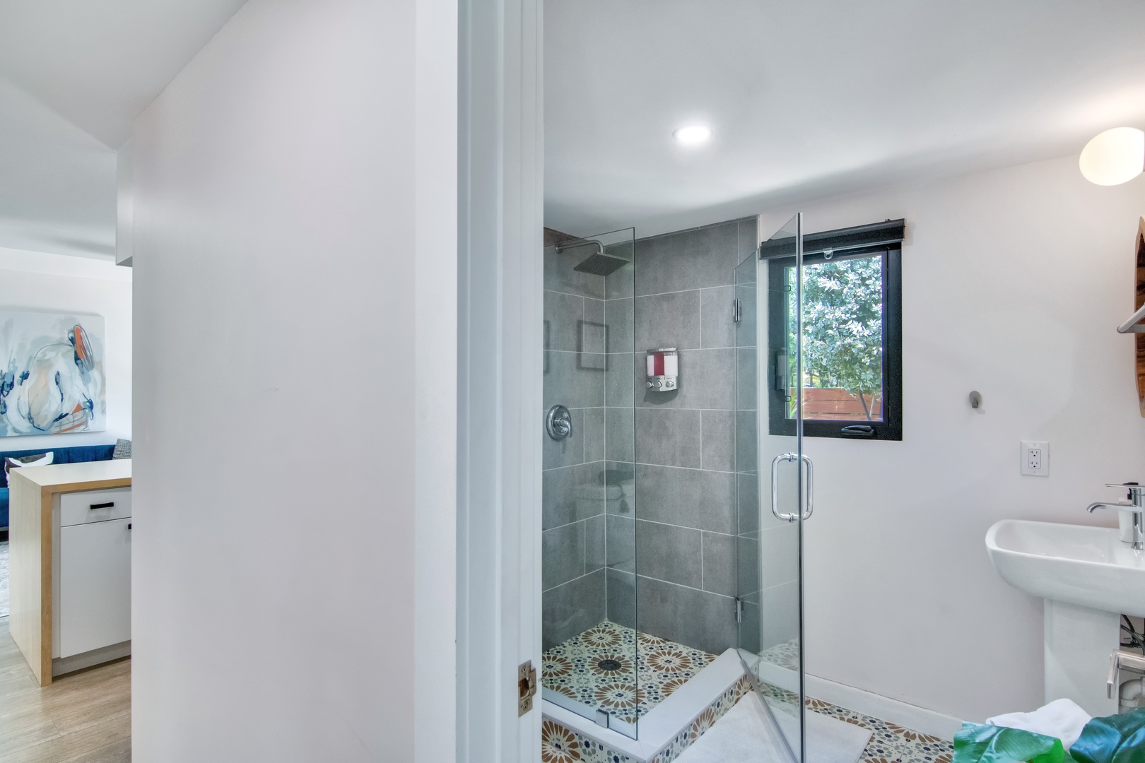 Shared bathroom with stand-up shower