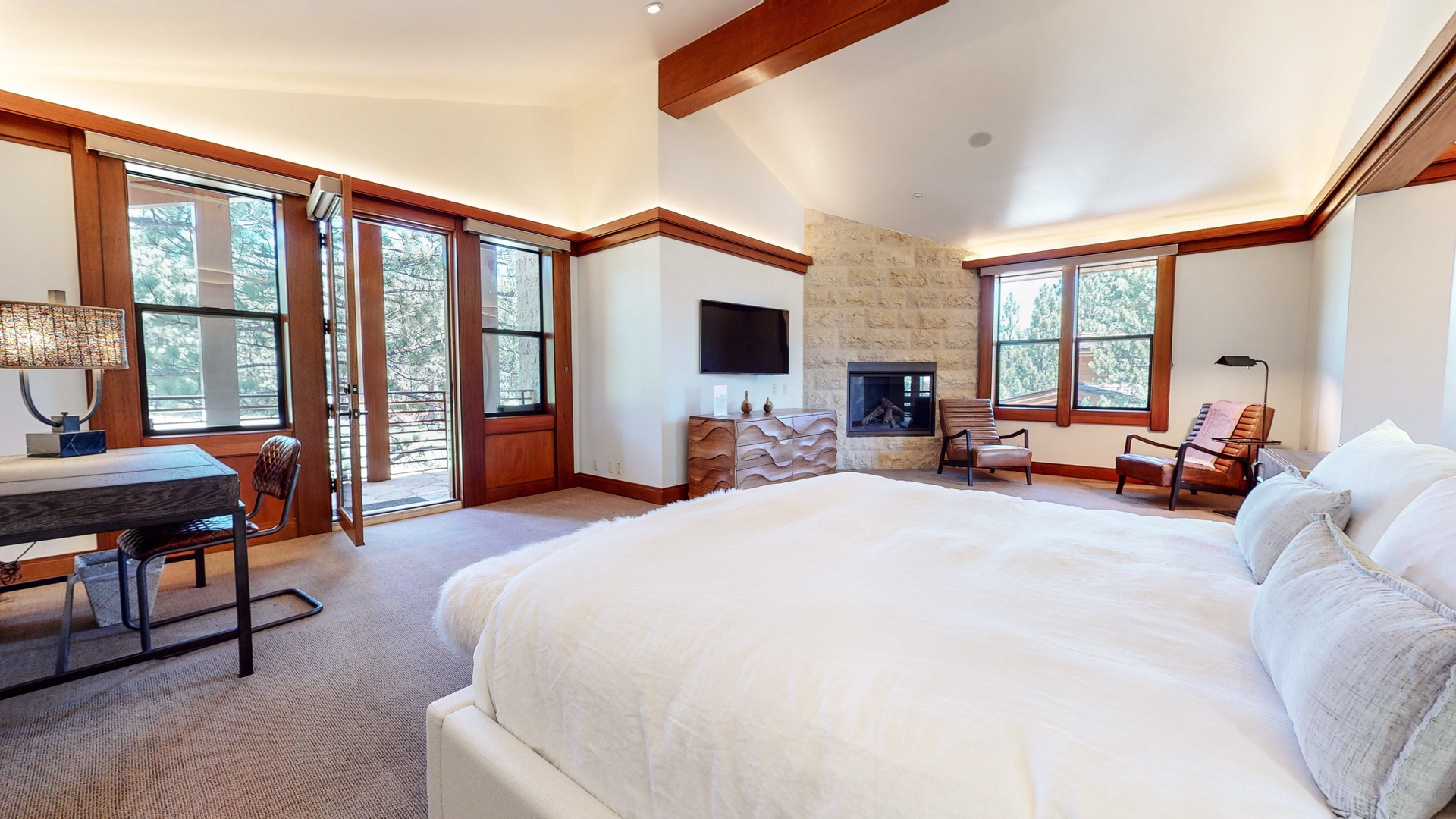 Bedroom 2 Master suite with King bed, TV, fireplace, desk, private en-suite, and deck  (3rd floor)