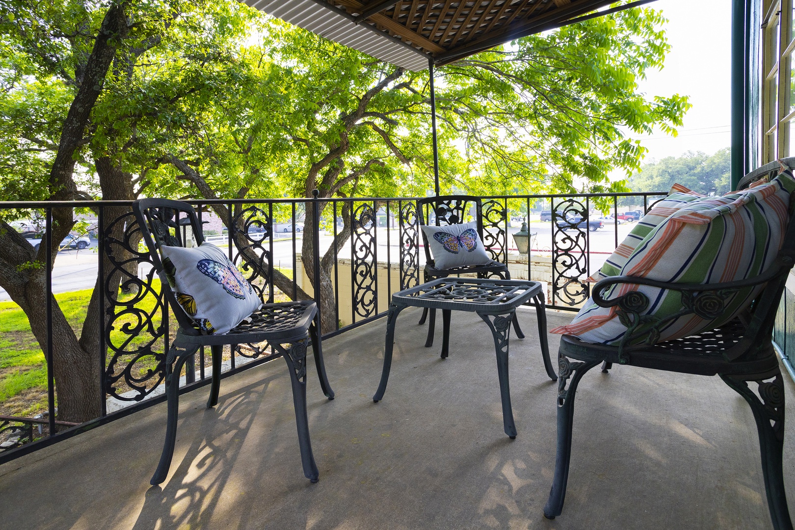 Lounge the day away in the fresh air on the breezy balcony