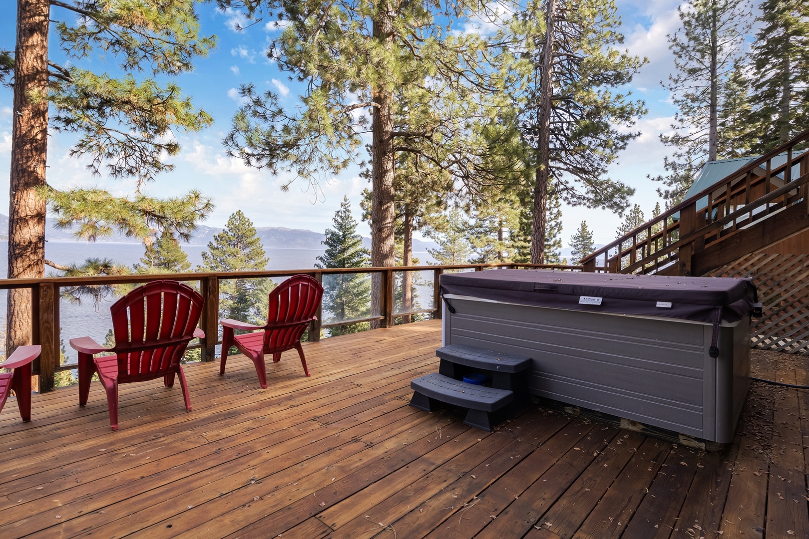 Lower deck with seating and hot tub