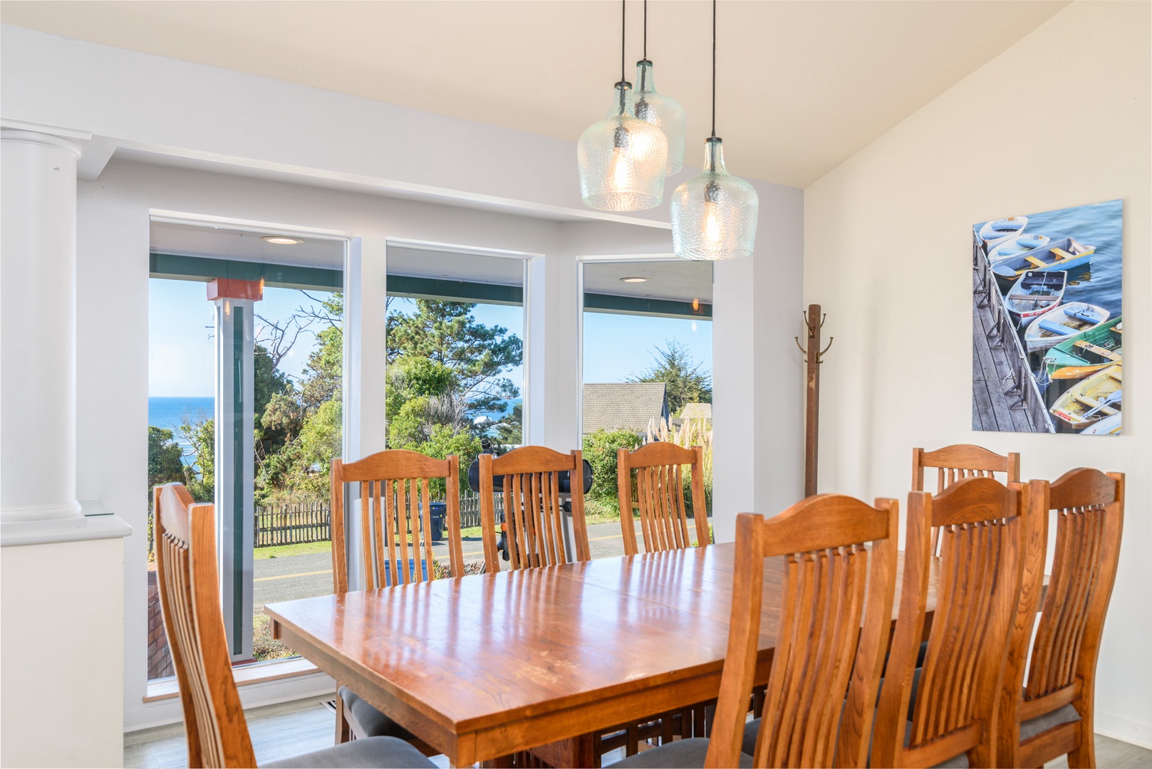 Dining room with table seating for 8 and ocean views