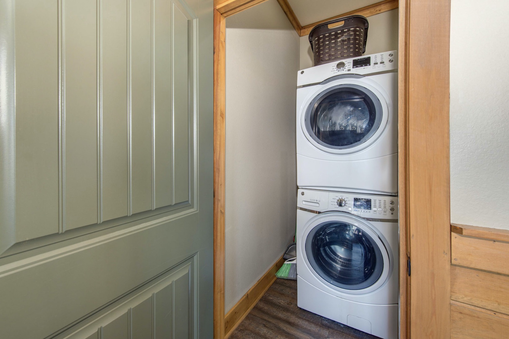 Private laundry is conveniently tucked away in a dedicated closet