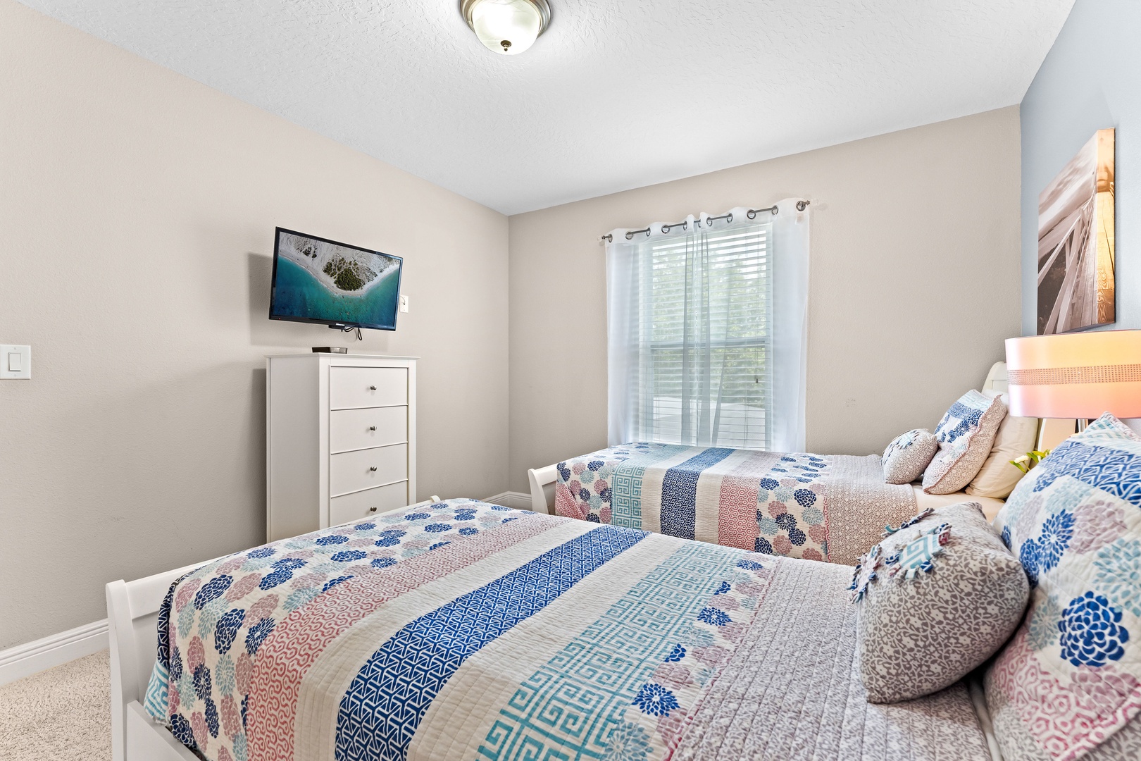 Bedroom 3 with 2 twin beds, Smart TV, and Jack & Jill style ensuite