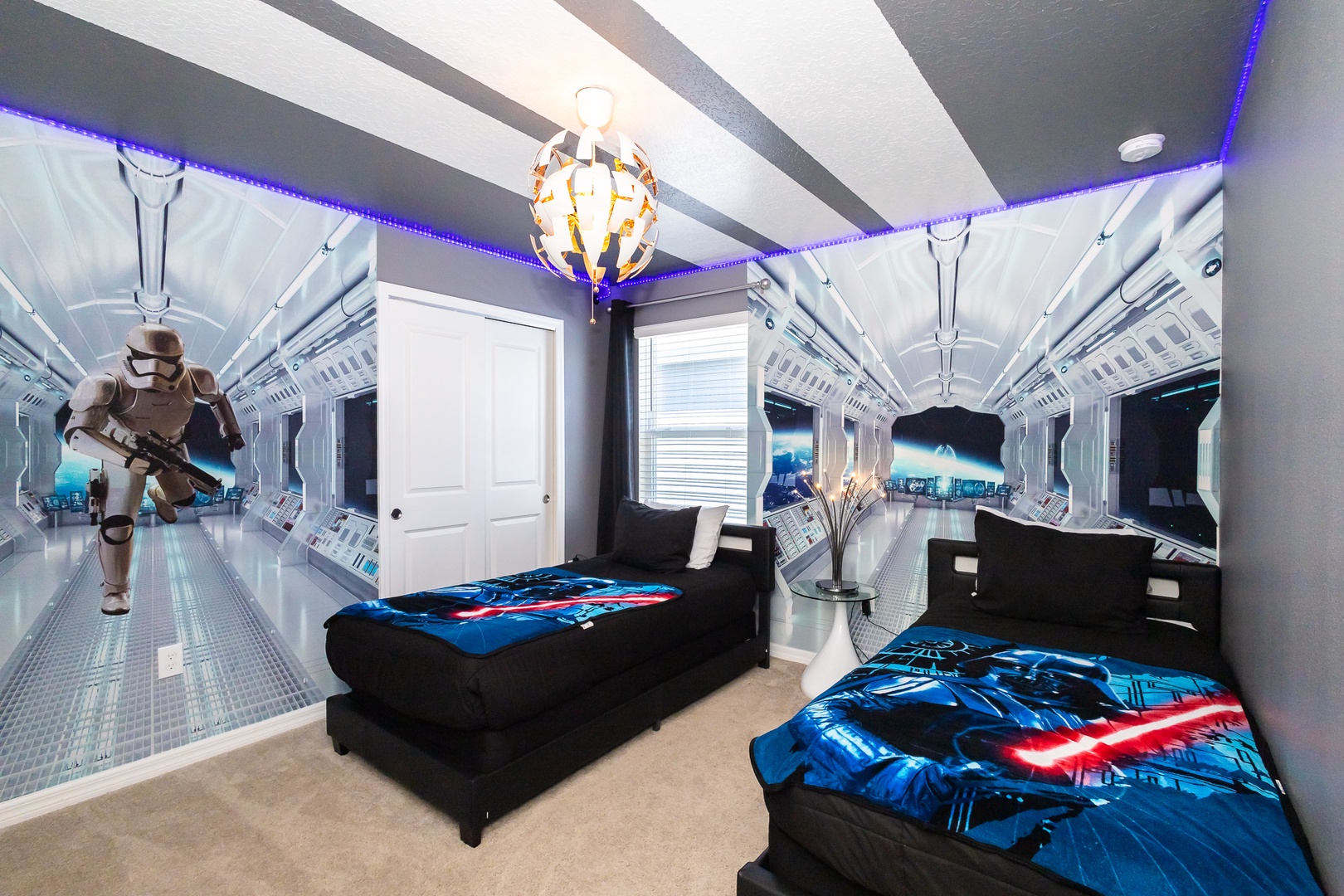 This 2nd floor bedroom with two twin beds & a Smart TV is out of this world!