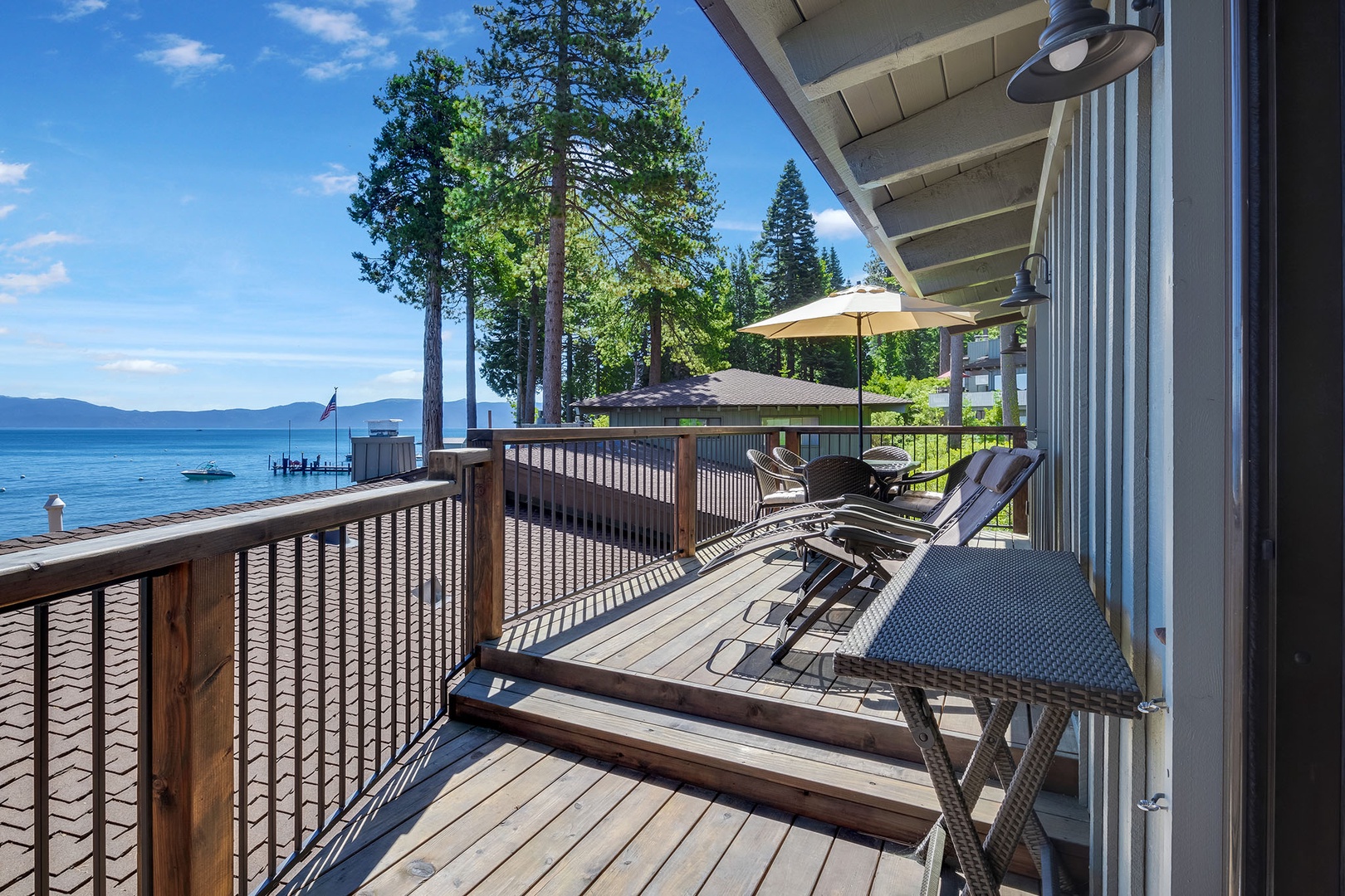 Lounge chairs and outdoor dining in the balcony