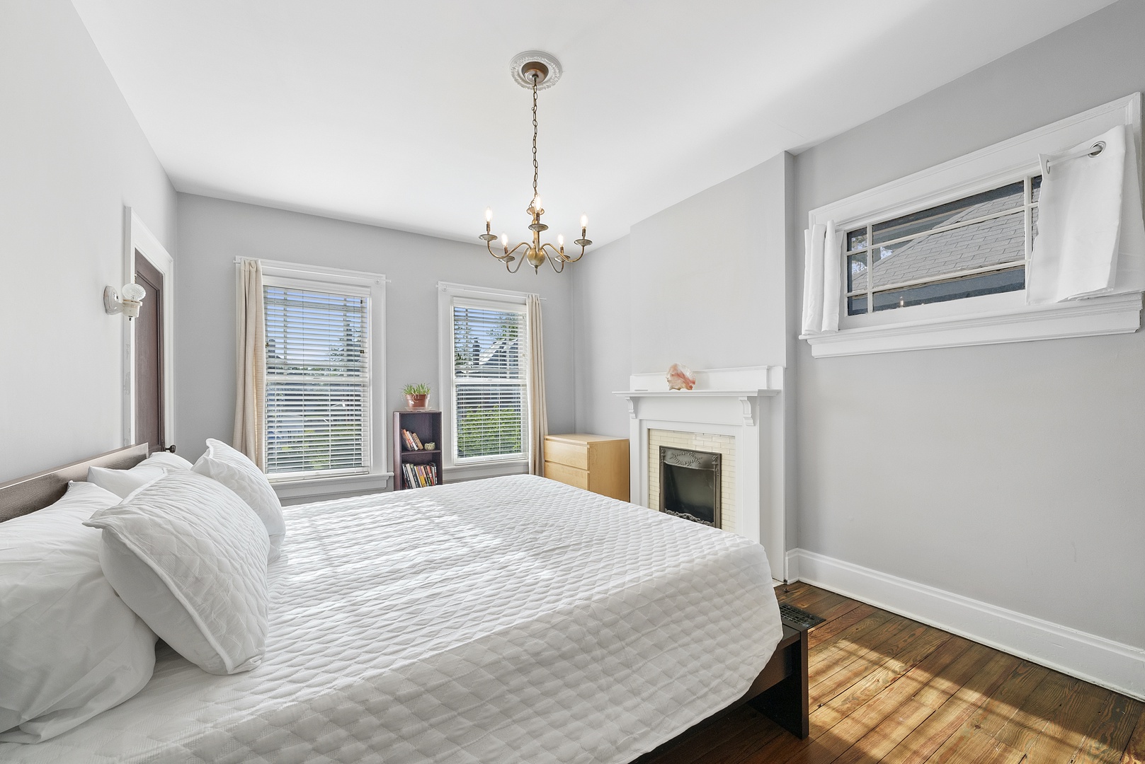 A luxurious king bed awaits in this second-floor bedroom retreat