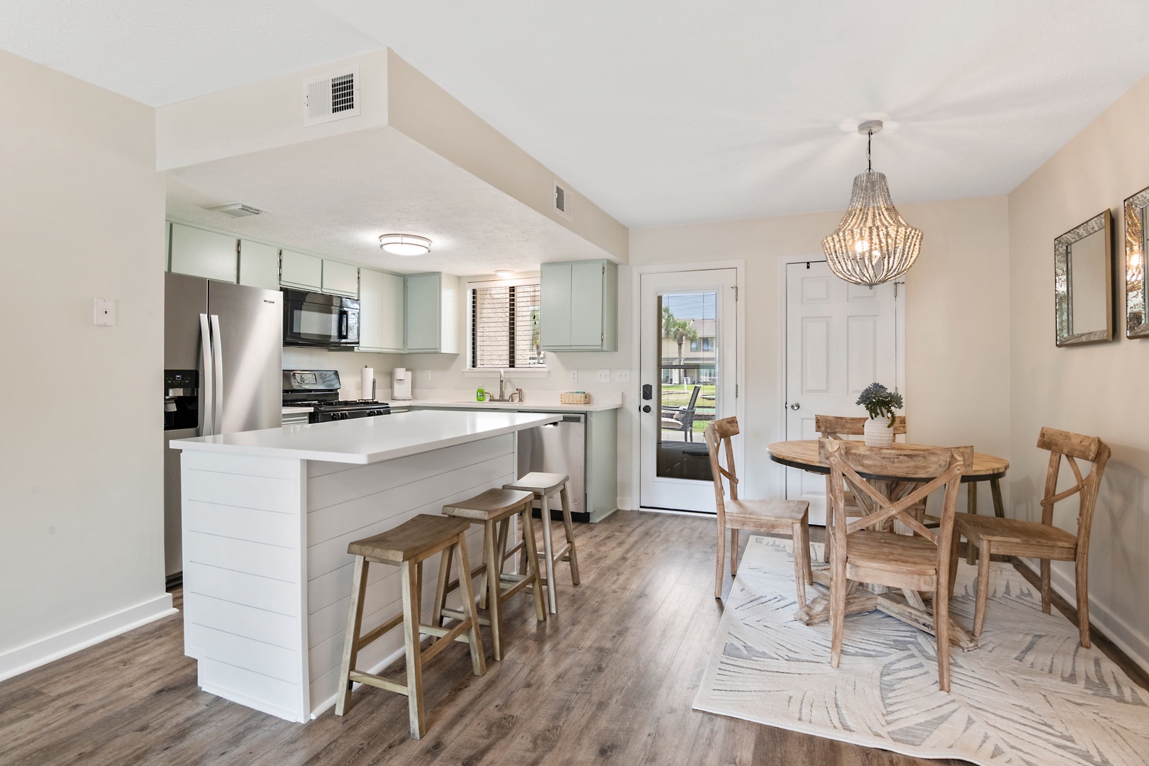 The open, airy kitchen offers ample space & all the comforts of home