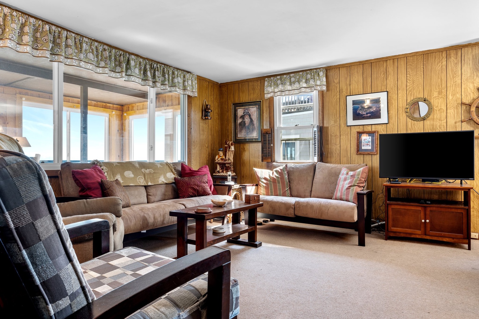 Open living area with Smart TV and comfy seating