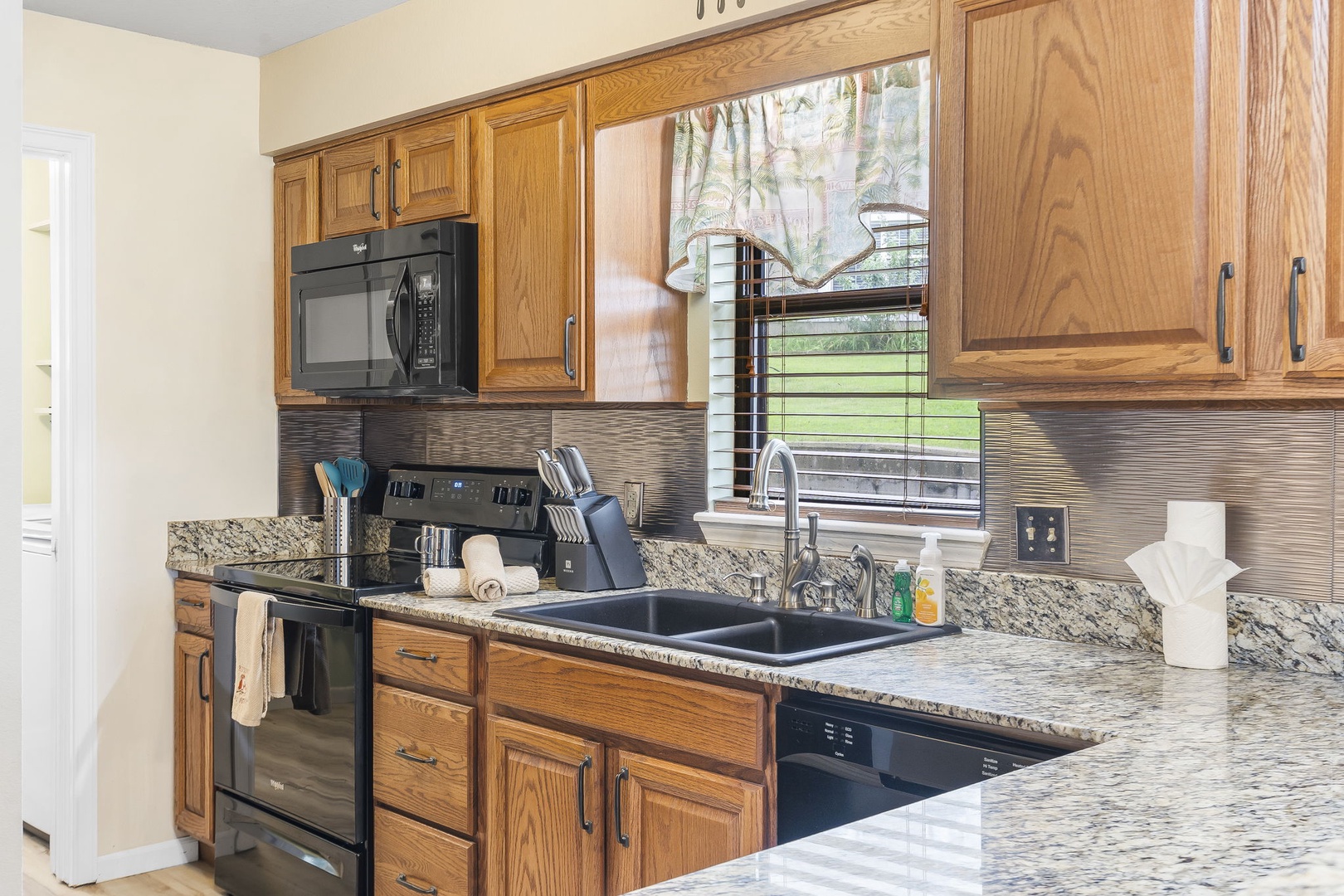 The kitchen offers ample counter space & all the comforts of home