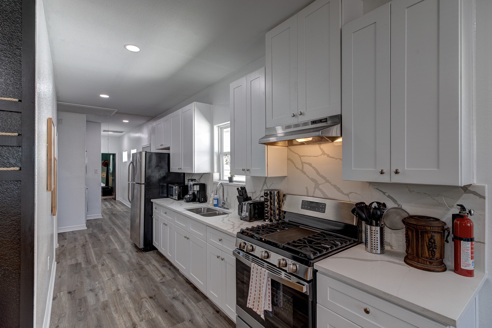 The open, airy kitchen offers ample space & all the comforts of home